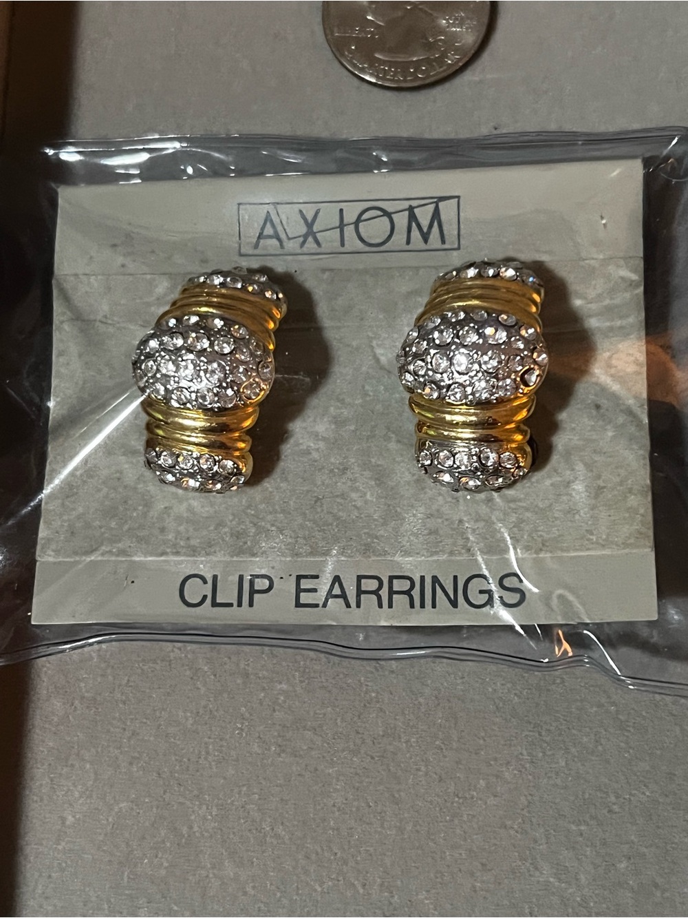 AXIOM Gold-Tone Crystal Clip Earrings - Sparkling Clear Stones